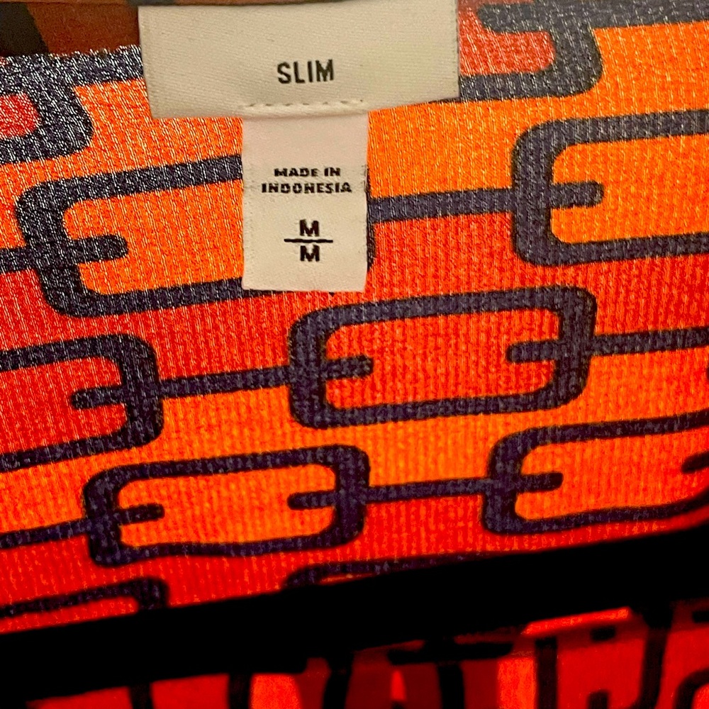 Burnt orange with Navy design slim fit, 100% Polyester. New without tags.